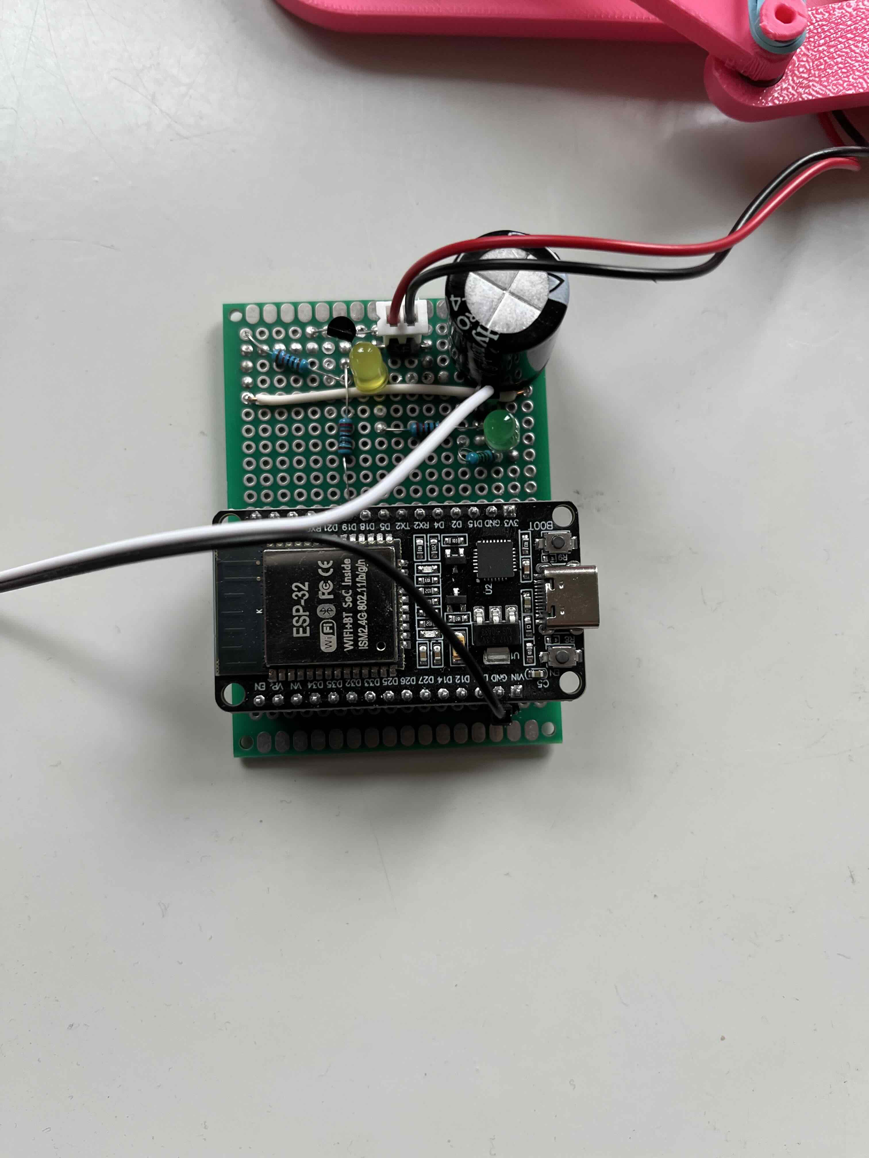 Solenoid driver circuit with boost converter and capacitor